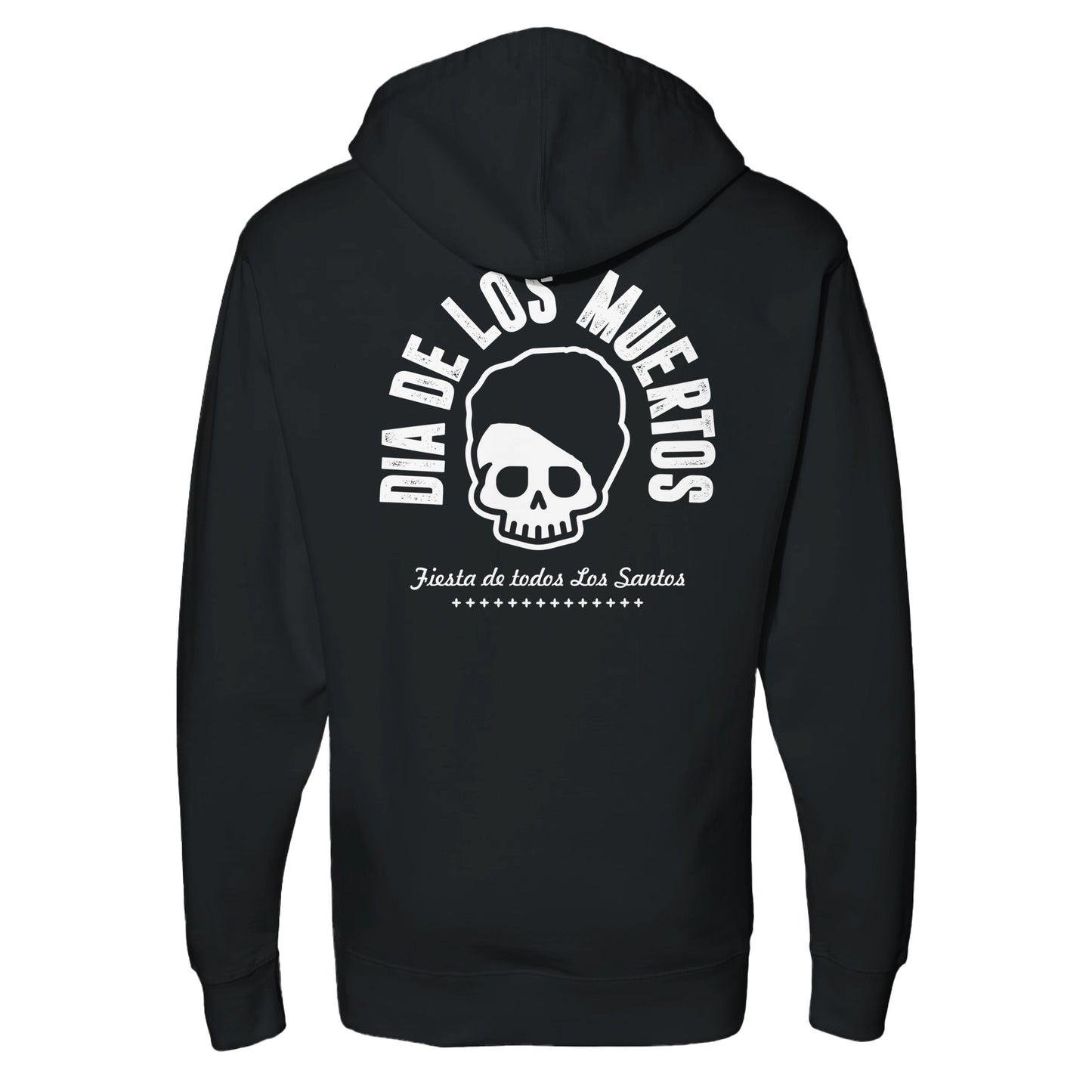 "Black hoodie featuring white text 'Día de los Muertos' arched above a cartoon skull with styled hair, and 'Fiesta de todos Los Santos' below—blending streetwear with cultural homage to Day of the Dead."