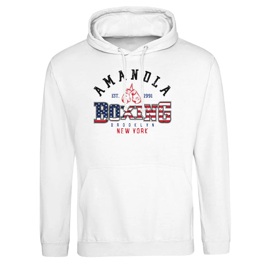 Artic White Hoodie Amandla Boxing' with American flag pattern inside the word 'Boxing', red boxing gloves, and location text 'Brooklyn, New York'—symbolizing strength, heritage, and fight culture."