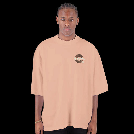 Minimalist vinyl record design with Japanese katakana for turntable on peach t-shirt front