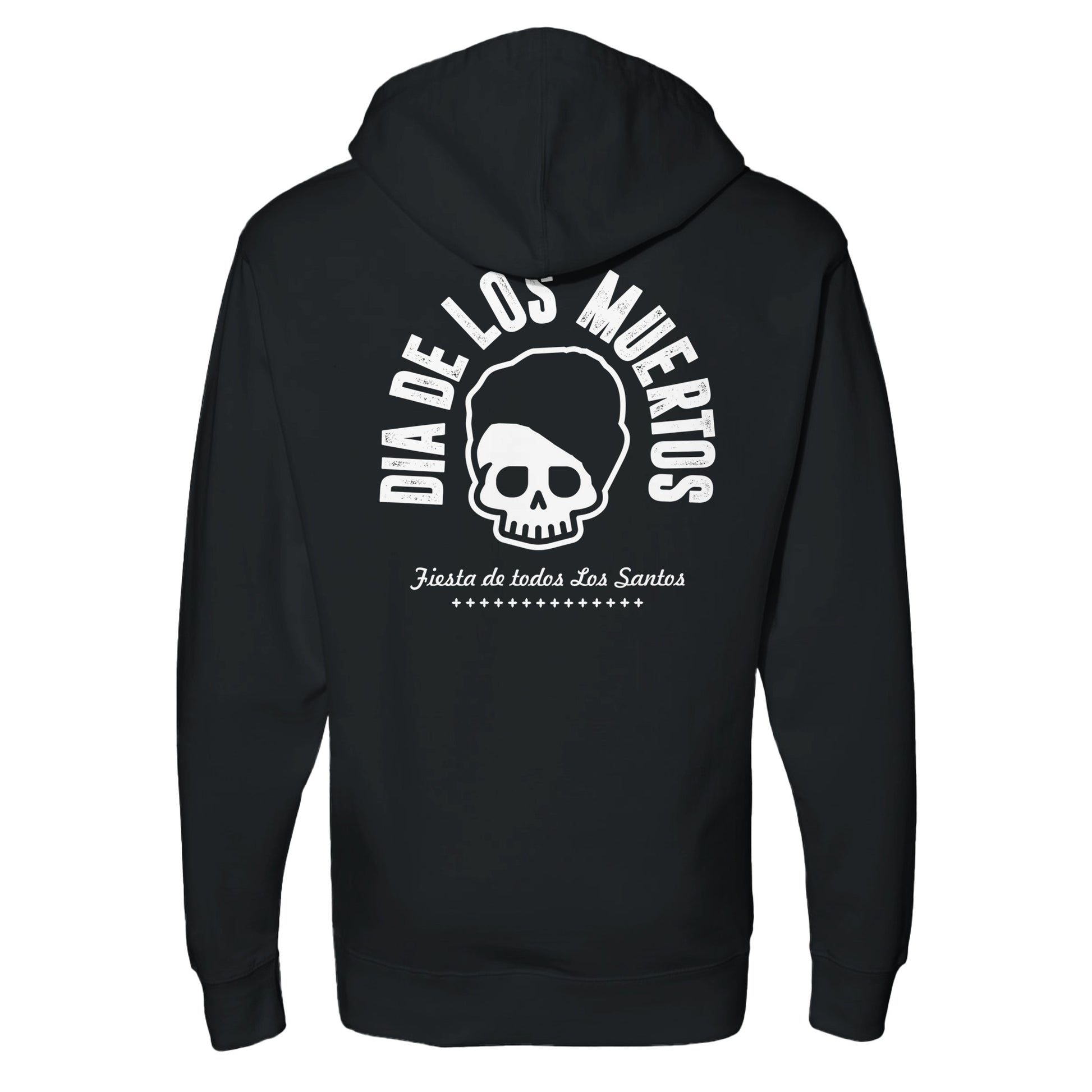 "Black hoodie featuring white text 'Día de los Muertos' arched above a cartoon skull with styled hair, and 'Fiesta de todos Los Santos' below—blending streetwear with cultural homage to Day of the Dead."

