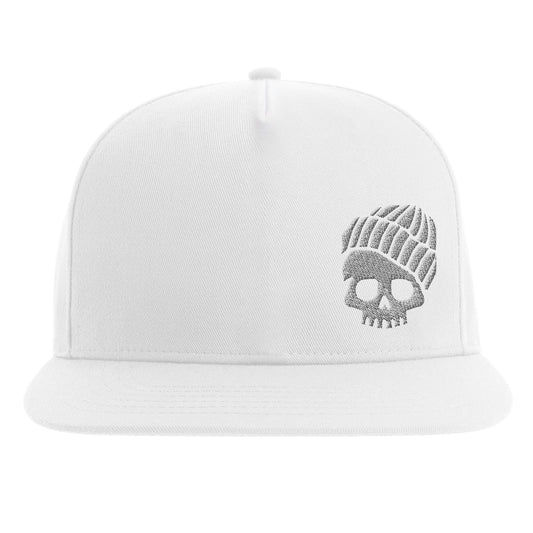 "White snapback hat featuring a grey embroidered cartoon skull wearing a beanie—clean, minimalist design blending subtle streetwear style with edgy character."

