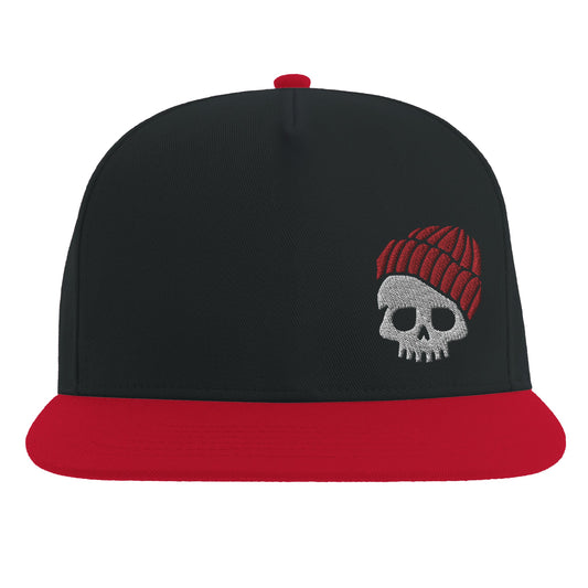 "Black and red snapback hat with minimalist embroidered design of a black skull wearing a red knit beanie—blending casual streetwear with edgy cartoon aesthetics."
