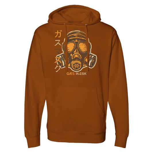 "White hoodie with a detailed sepia-toned halftone gas mask illustration, vertical Japanese katakana text on the left, and '(GAS MASK)' written below—combining dystopian streetwear with earthy retro tones."
