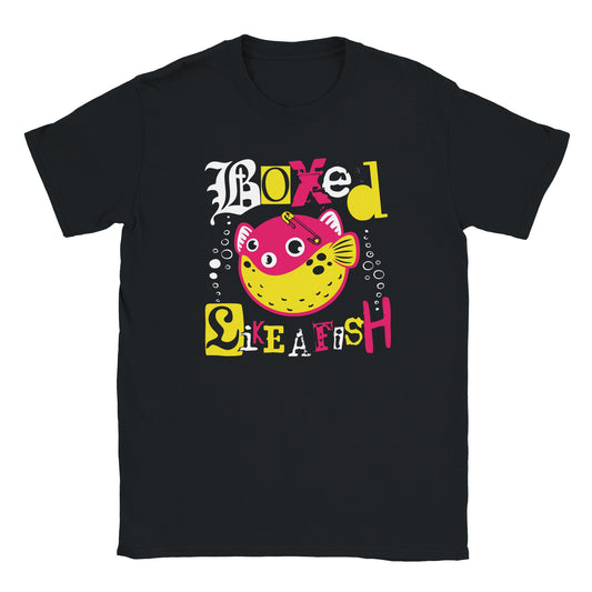 Black T-shirt with bold pink and yellow pufferfish graphic and mixed-style text reading “Boxed Like a Fish”