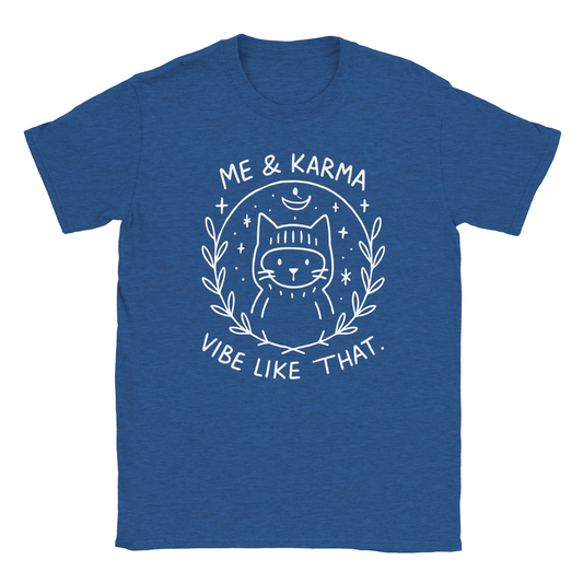 Graphic navy T-shirt featuring white line art of a cat with the phrase Me & Karma Vibe Like That, cosmic stars and moon design